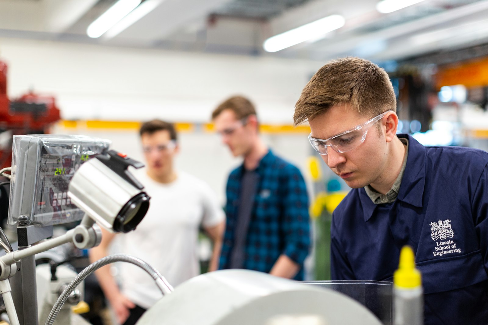 Engineering team working in a robotics lab